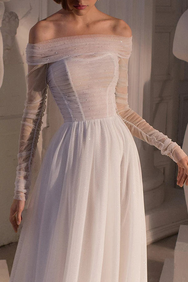 Abito da sposa da spiaggia a trapezio con maniche lunghe e strascico, senza spalline e perle